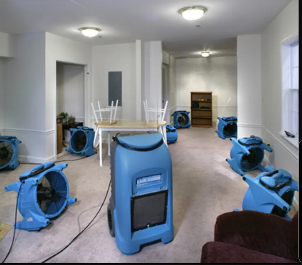 Air movers and dehumidifier setup for Water Damage Restoration in Hapeville