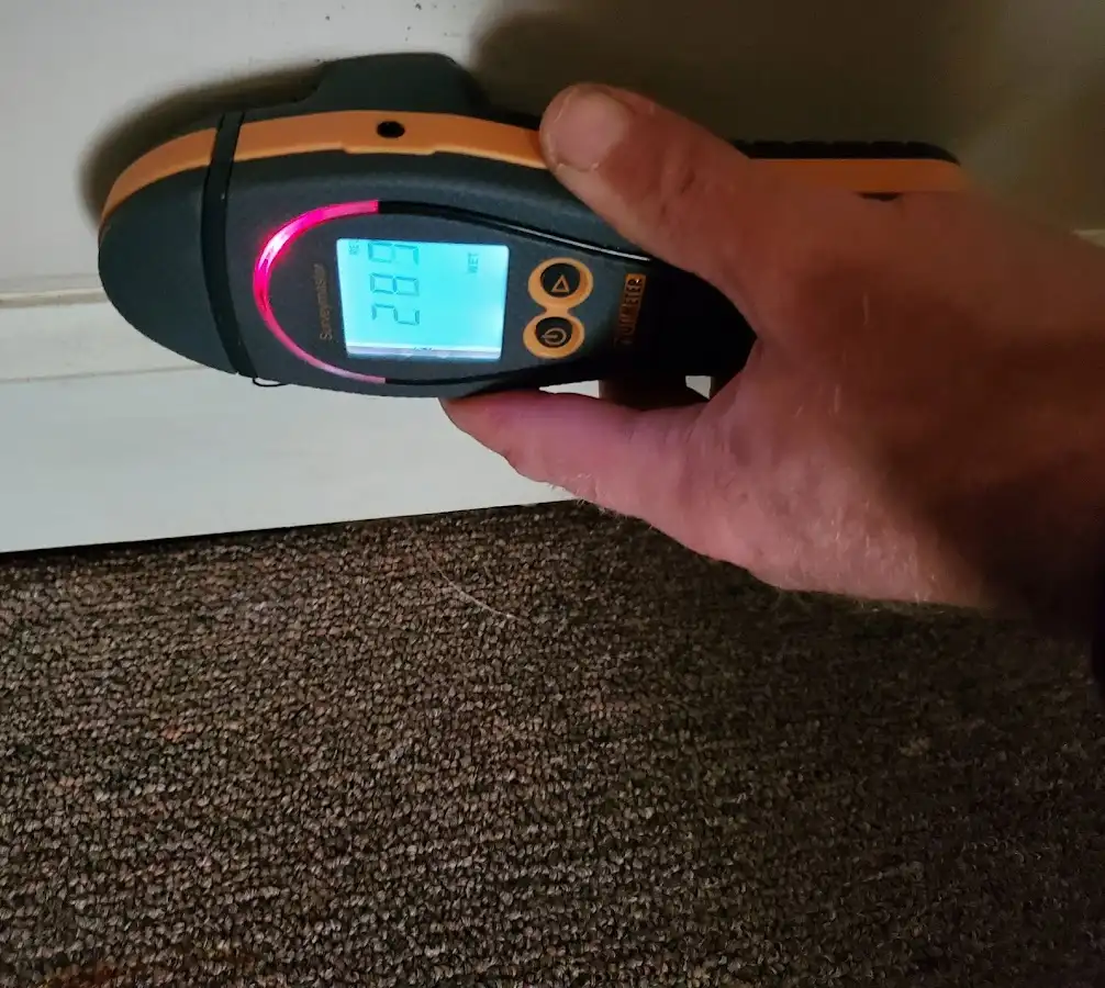 Moisture detection at baseboard during Sewage Cleanup & Sanitation in Hapeville